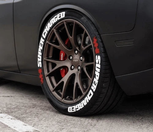 Supercharged Tire Stickers shown on a tire or vehicle wheel