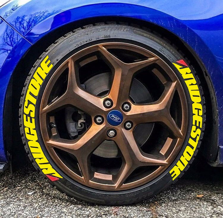Bridgestone yellow tire stickers installed on car tire